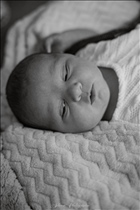 Shooting photo effectué par le photographe Iliana  à Élancourt : photographie de nouveau né